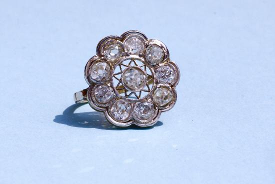 ANTIQUE DIAMOND DAISY CLUSTER ENGAGEMENT RING