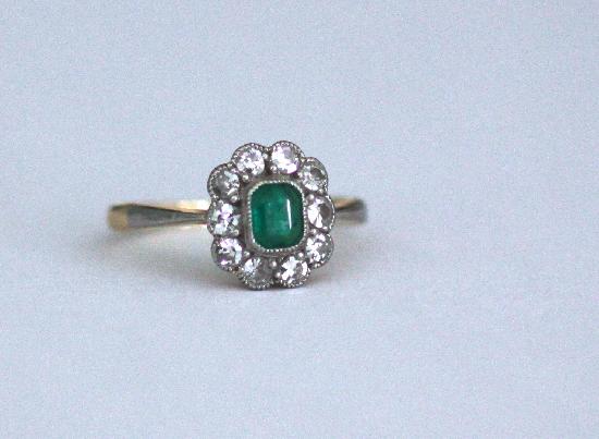 ANTIQUE EMERALD AND DIAMOND CLUSTER ENGAGEMENT RING