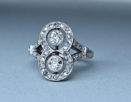 CONTINENTAL ANTIQUE DOUBLE DIAMOND ENGAGEMENT RING