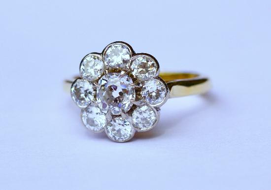 OLD-CUT DIAMOND DAISY CLUSTER ENGAGEMENT RING