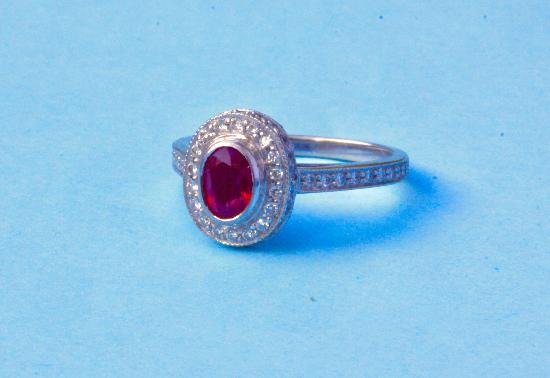 PRETTY RUBY AND DIAMOND CLUSTER ENGAGEMENT RING