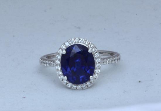 SAPPHIRE AND DIAMOND CLUSTER ENGAGEMENT RING