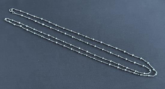 EDWARDIAN PLATINUM AND PEARL LONG GUARD CHAIN.
