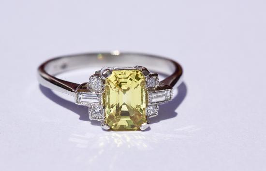 FINE QUALITY YELLOW SAPPHIRE AND DIAMOND ENGAGEMENT RING