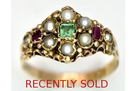 15CT ANTIQUE GEM SET RING.