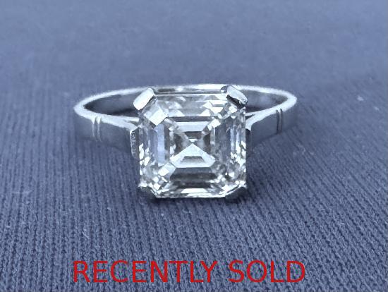 ASSCHER CUT DIAMOND RING.