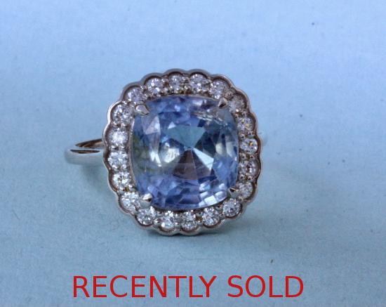 CUSHION SHAPE SAPPHIRE AND DIAMOND RING WITH A CERTIFICATE 