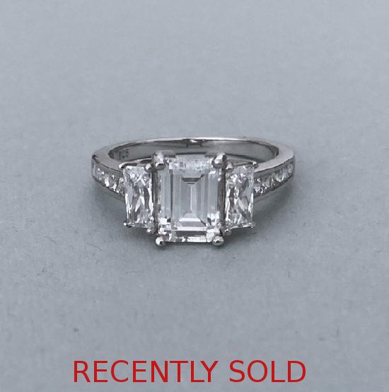 EMERALD-CUT WITH SHOULDERS WOW RING