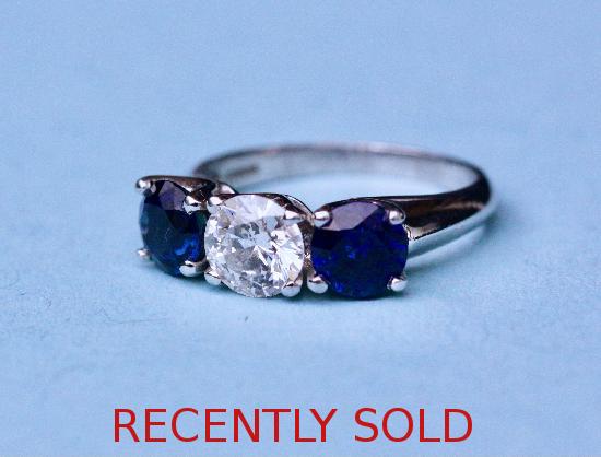 LARGE SAPPHIRE AND DIAMOND THREE STONE ENGAGEMENT RING