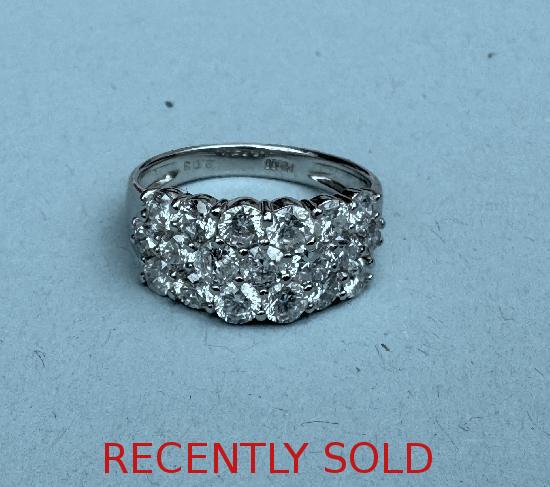 PLATINUM DIAMOND THREE ROW RING.