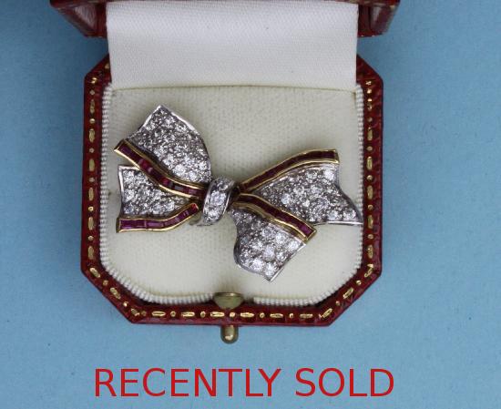 RUBY AND DIAMOND RIBBON TIED BOW BROOCH