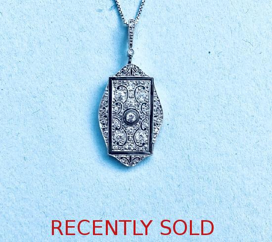 STUNNING ART DECO ONYX AND DIAMOND PENDANT