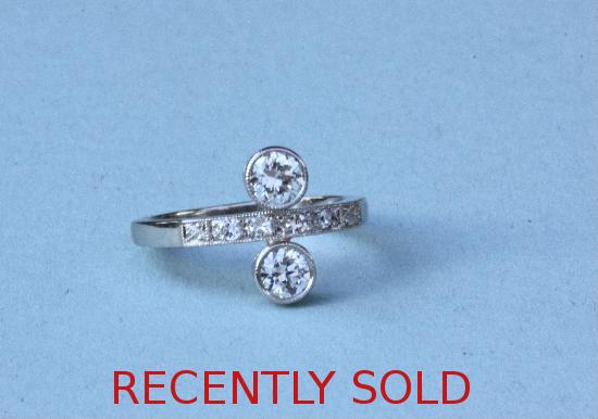 STYLISH DOUBLE DIAMOND ENGAGEMENT RING.
