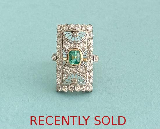 UNUSUAL RETRO EMERALD AND DIAMOND RING
