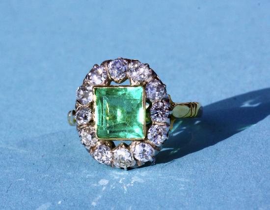 STUNNING ANTIQUE EMERALD AND DIAMOND ENGAGEMENT RING