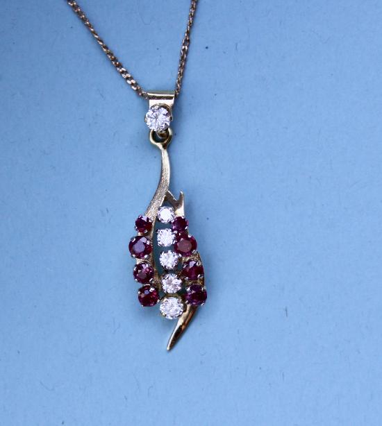 VINTAGE RUBY AND DIAMOND PENDANT AND CHAIN