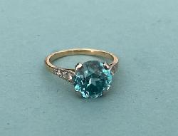 A Gorgous Blue Zircon And Diamond Solitaire  Ring