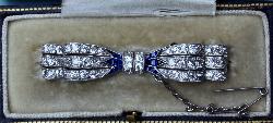 Art Deco Diamond And Sapphire Tied Bow Brooch