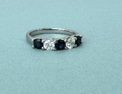 Platinum Sapphire And Diamond Ring.