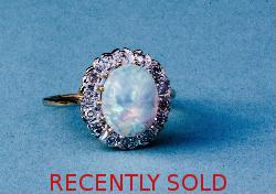 Beautiful Opal And Diamond Ring