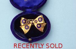 Charming Gold And Colbalt Enamel Bow Brooch