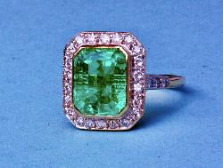 Vintage Emerald And Diamond Engagement Ring